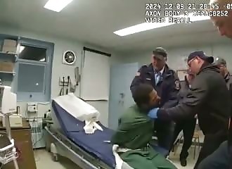 Prison guards charged with murder of handcuffed inmate