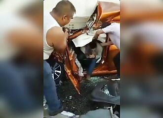 Motorist escapes unhurt from car crushed by truck in accident
