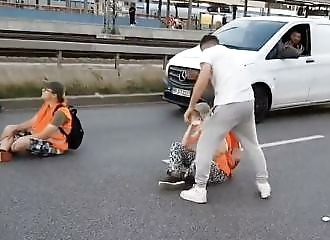 A motorist gets angry and smashes road blockers