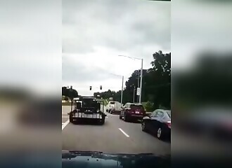 Truck collides with four cars at red light