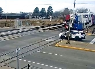 Here we have the moron du jour who loses his car, smashed by a train