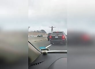 She exposes herself during a police chase