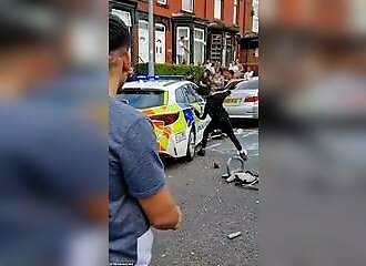Night-time brawl in Leeds: rioters set fire to bus and damage police car