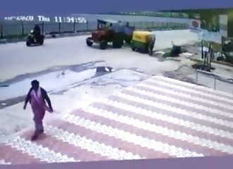 A man flies away, lifted by a cable