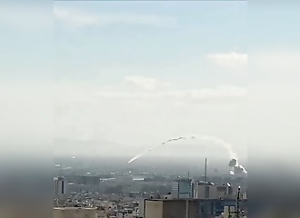 An Iranian missile crashes into a residential neighborhood in Tehran