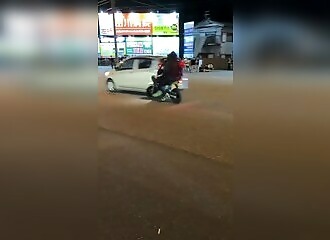 A motorcyclist and his passenger flee after colliding with a car