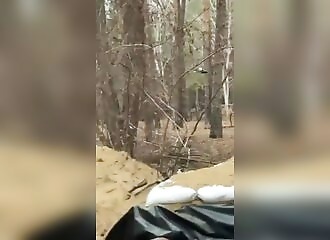 Ukrainian soldiers film a Russian drone searching for them in the forest 