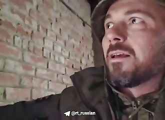   A Russian soldier hides as he is pursued by drones