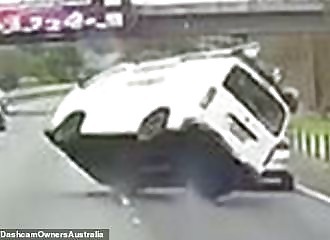 A van driver suddenly loses control of his vehicle and overturns on an expressway