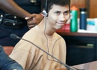   A migrant smiles as he is sentenced to a year in prison for hitting a police officer (Video of the assault)  