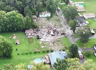 A stolen car hits a gas main and annihilates a house in New York City