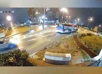 Wow - He flies his car over a traffic circle and lands on two others