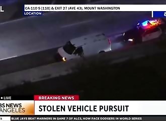 He is hit by a speeding car while trying to escape from the police (Warning - shocking)