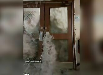 A wave fills a restaurant with water in seconds