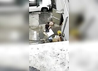 Filmed cutting up frozen meat in the street, his restaurant is closed