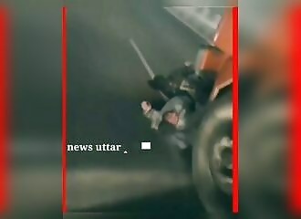 Two men miraculously saved after being dragged along a highway by a truck in India