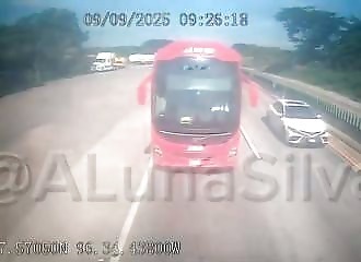 A bus catches fire in an accident, but all the occupants manage to get out and survive